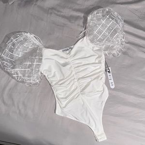 Story On White Ruffled Fancy Bodysuit